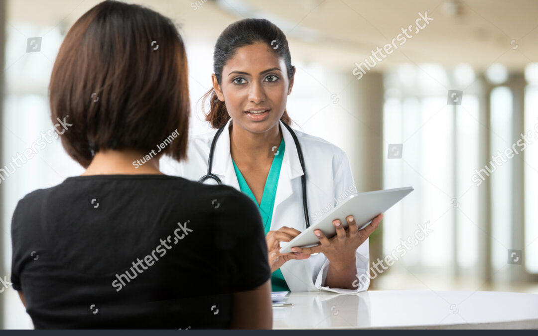 stock-photo-indian-doctor-talking-with-female-patient-in-doctors-office-110078714